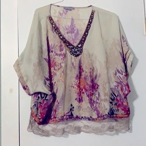 Tunic blouse with beaded neckline and lace trim